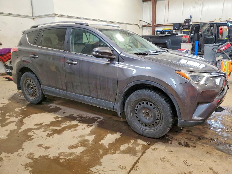 Photo 4 from auction – 2018 TOYOTA RAV4 LE with VIN 2T3BFREV5JW752046
