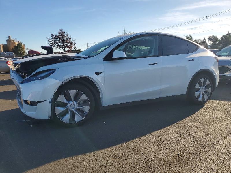 TESLA MODEL Y 2023 con VIN 7SAYGAEE8PF700081 - Foto de la subasta