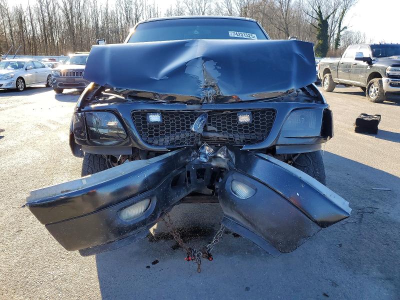 Photo 5 from auction – 2002 FORD F150 SUPER with VIN 1FTRW08L32KB51054