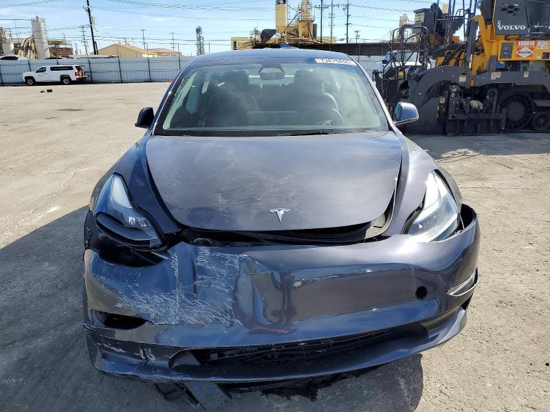 Photo 5 from auction – 2023 TESLA MODEL 3 with VIN 5YJ3E1EA9PF663245