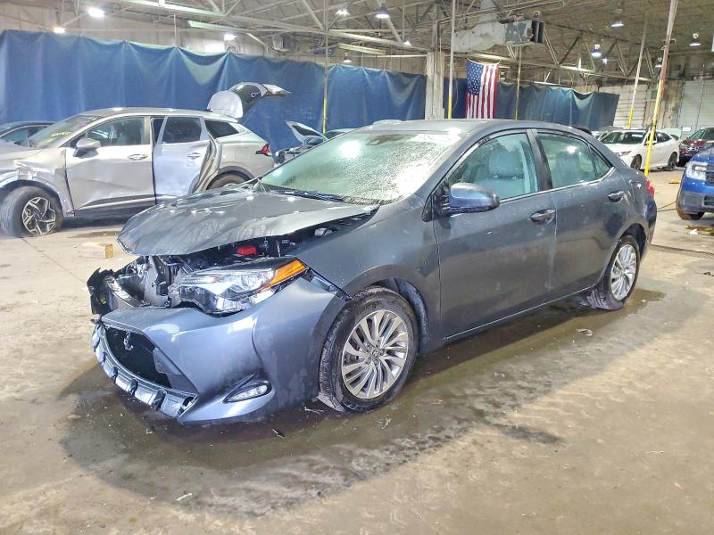TOYOTA COROLLA 2017 with VIN 2T1BPRHE5HC747961 - Photo from auction