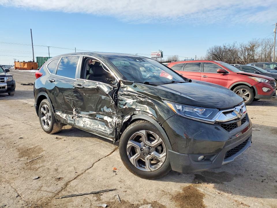 Photo 4 from auction – 2017 HONDA CR-V EXL with VIN 7FARW1H82HE031998