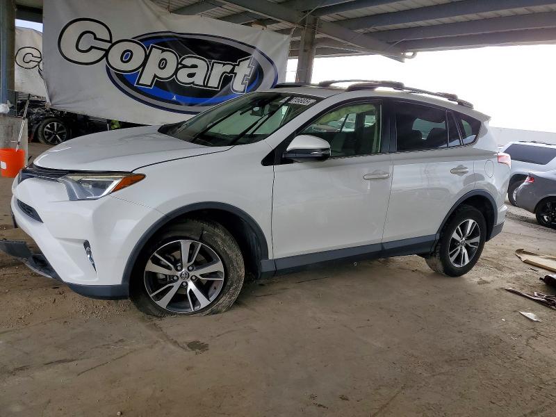 TOYOTA RAV4 XLE 2017 with VIN JTMRFREV4HD213374 - Photo from auction