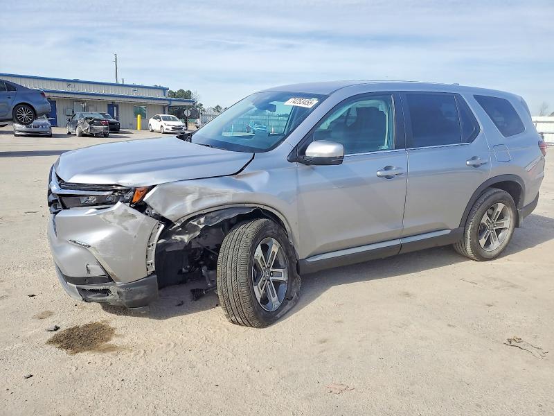 HONDA PILOT 2023 with VIN 5FNYG2H56PB012935 - Photo from auction