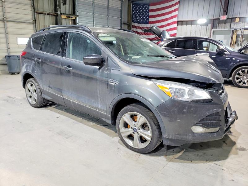 Photo 4 from auction – 2016 FORD ESCAPE SE with VIN 1FMCU9GX7GUB50579