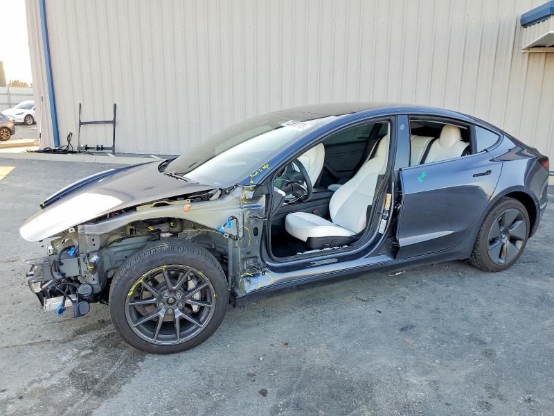 TESLA MODEL 3 2021 with VIN 5YJ3E1EB0MF072032 - Photo from auction