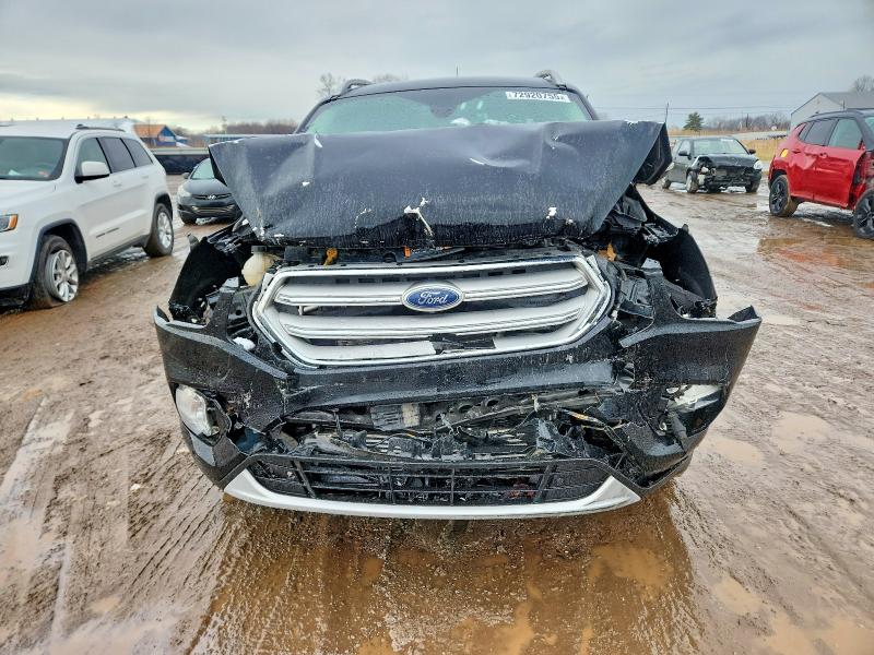 Photo 5 from auction – 2018 FORD ESCAPE with VIN 1FMCU9J93JUD45239