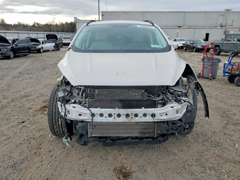 Photo 5 from auction – 2017 FORD ESCAPE SE with VIN 1FMCU9G92HUB85095