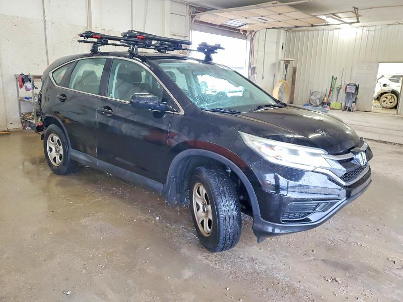 Photo 4 from auction – 2016 HONDA CR-V LX with VIN 2HKRM3H35GH502043