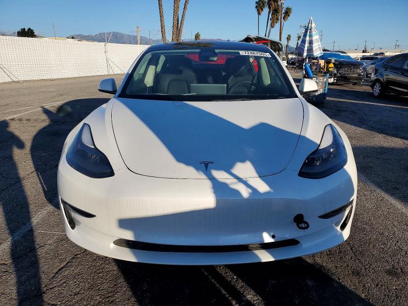 Photo 5 from auction – 2022 TESLA MODEL 3 with VIN 5YJ3E1EA9NF113637
