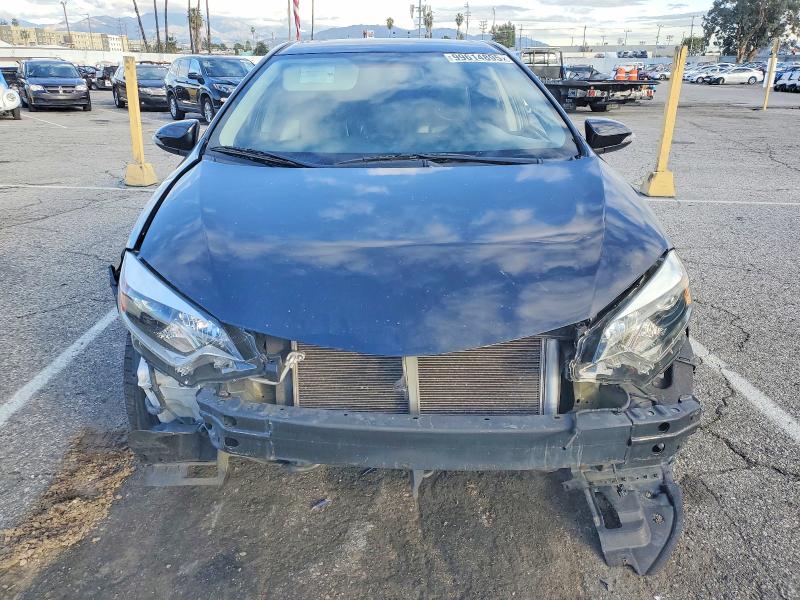 Photo 5 from auction – 2015 TOYOTA COROLLA with VIN 5YFBURHE0FP245624