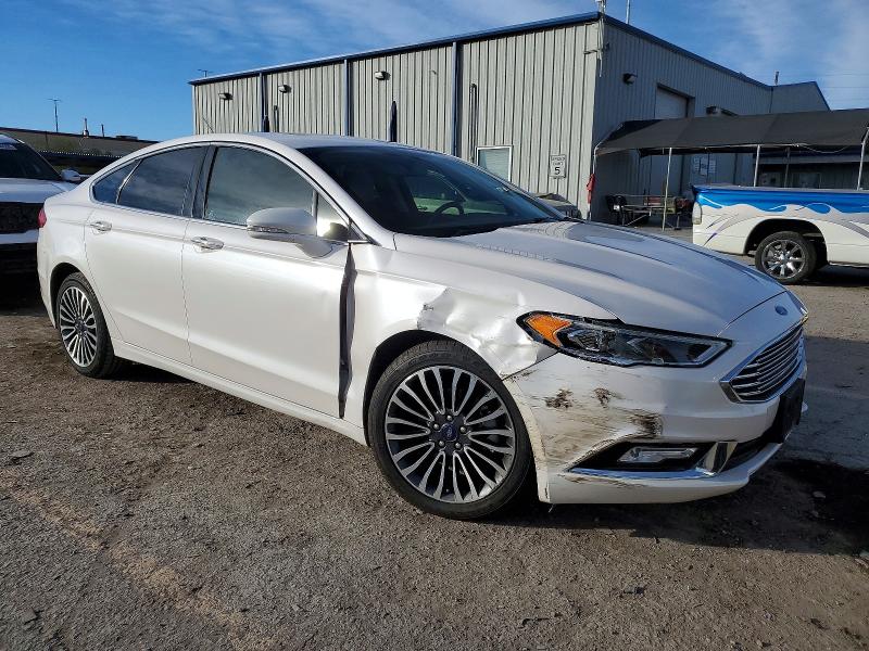 Photo 4 from auction – 2018 FORD FUSION TIT with VIN 3FA6P0D96JR247027