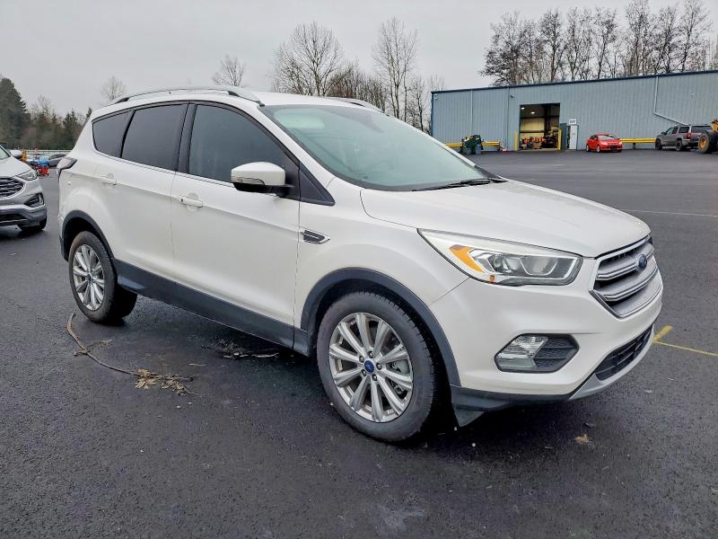 Photo 4 from auction – 2017 FORD ESCAPE TIT with VIN 1FMCU0J98HUB44748