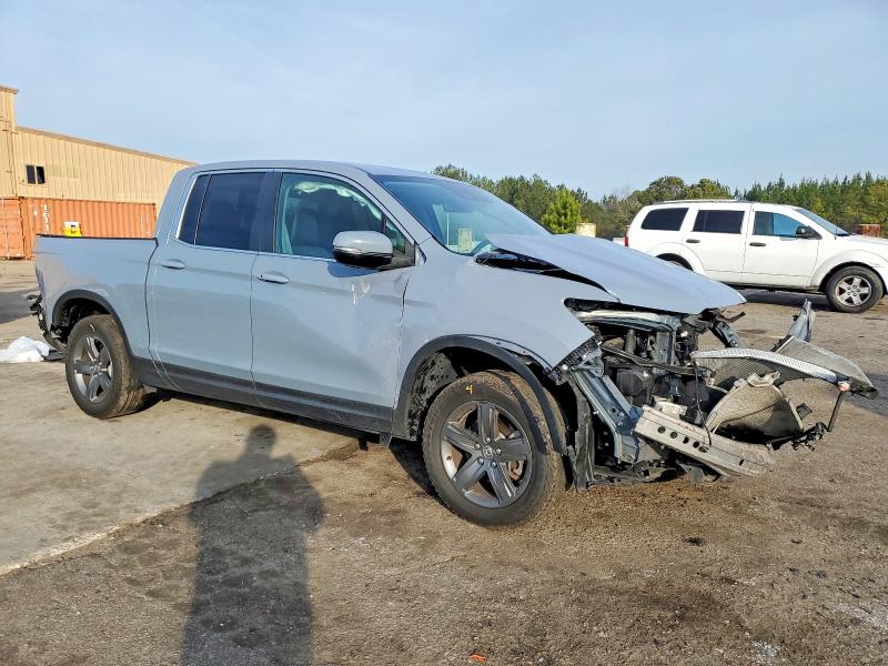 Photo 4 from auction – 2023 HONDA RIDGELINE with VIN 5FPYK3F54PB011541