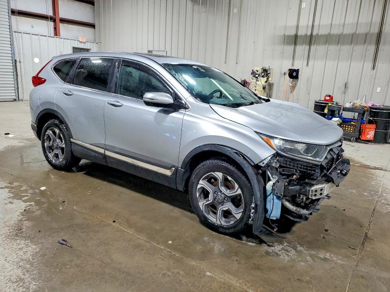 Photo 4 from auction – 2018 HONDA CR-V EX with VIN 7FARW2H50JE101404