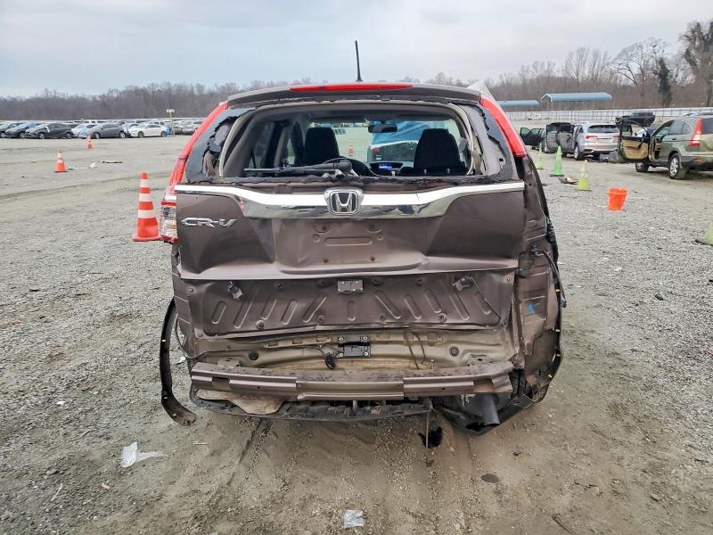 Photo 6 from auction – 2016 HONDA CR-V with VIN 2HKRM3H55GH522987