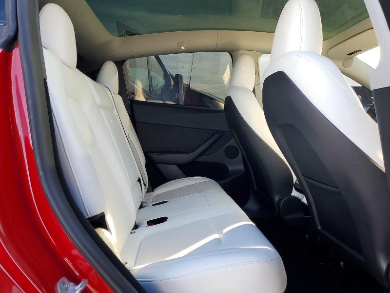 Photo 11 from auction – 2023 TESLA MODEL Y with VIN 7SAYGDEFXPF937102