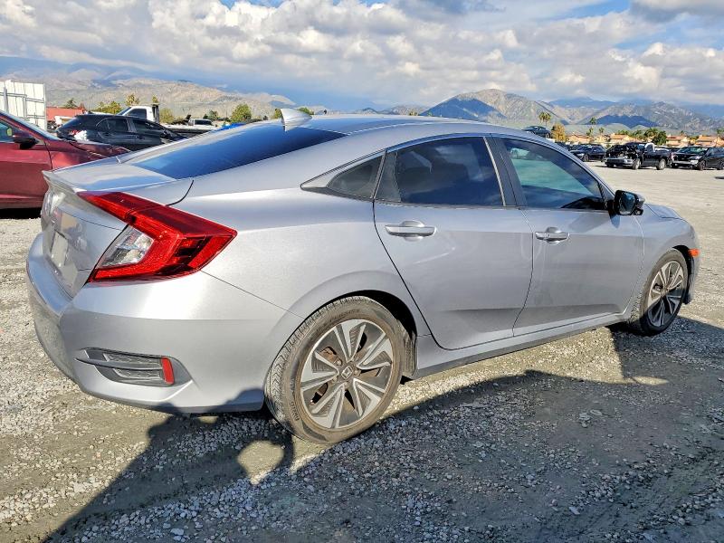 Photo 3 from auction – 2017 HONDA CIVIC EX with VIN 2HGFC1F39HH634005
