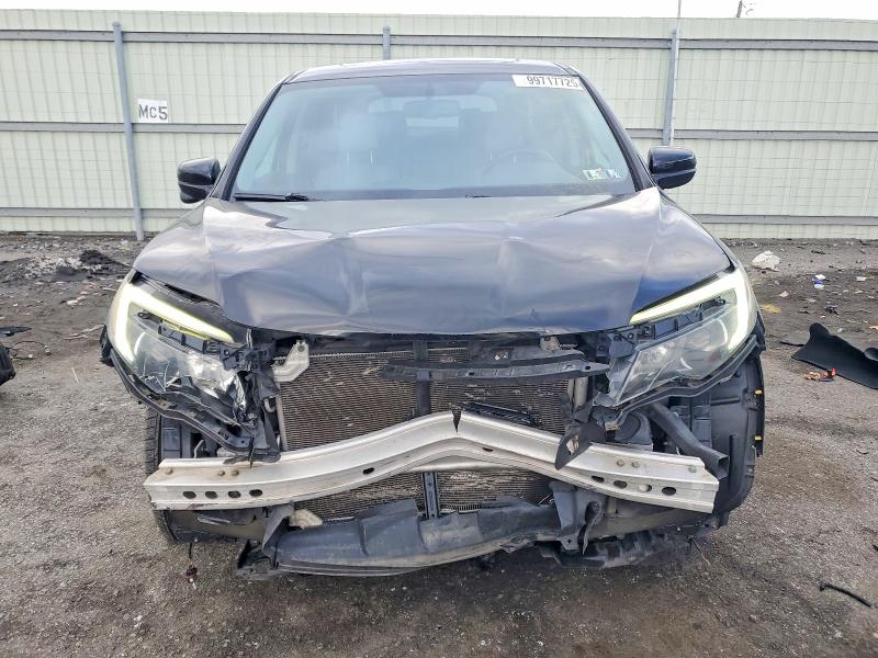Photo 5 from auction – 2016 HONDA PILOT EXL with VIN 5FNYF6H52GB067604