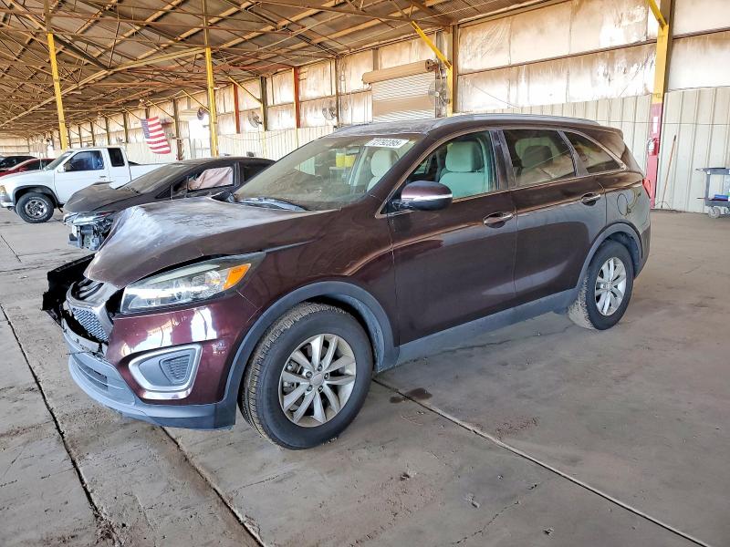 KIA SORENTO LX 2016 con VIN 5XYPG4A38GG034797 - Foto de la subasta