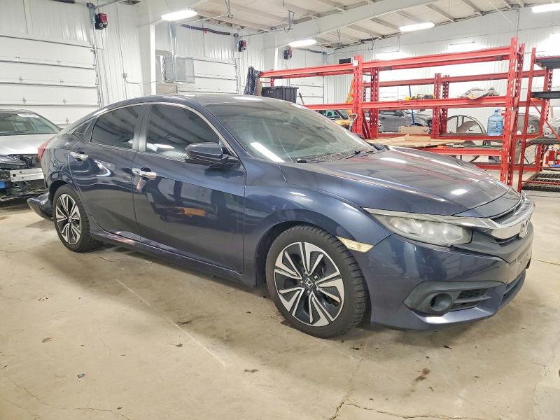 Photo 4 from auction – 2016 HONDA CIVIC EX with VIN 19XFC1F31GE220712