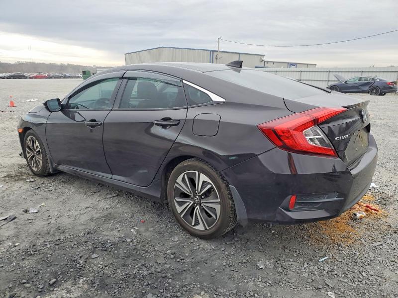 Photo 2 from auction – 2016 HONDA CIVIC with VIN 19XFC1F32GE015500