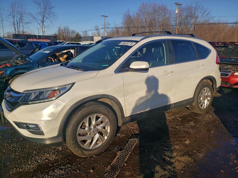 Photo 1 from auction – 2015 HONDA CR-V EXL with VIN 5J6RM4H7XFL008581
