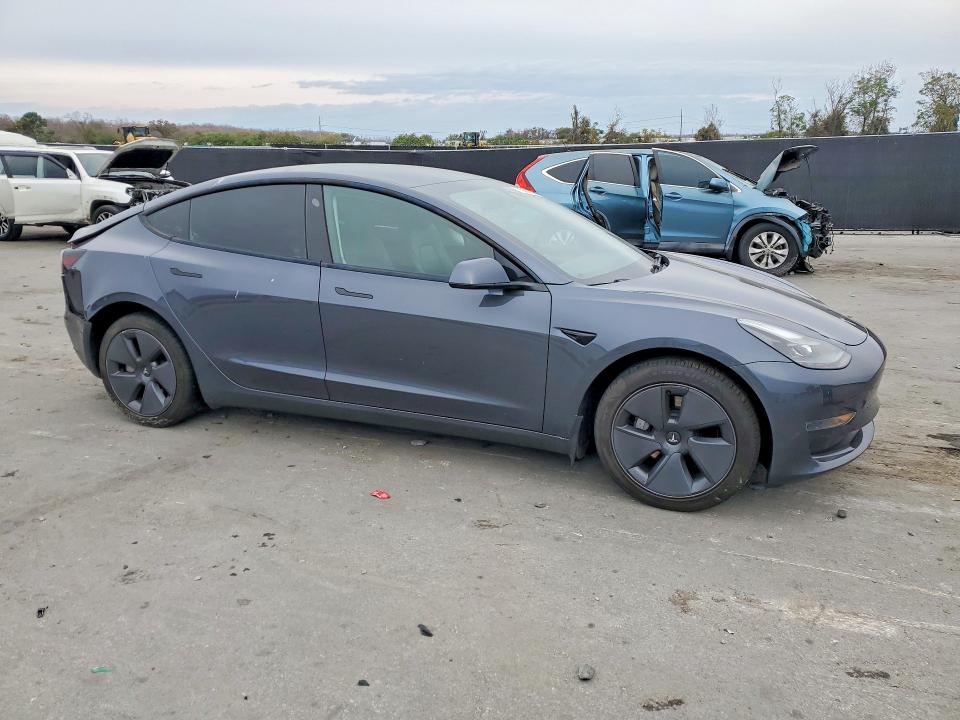 Photo 4 from auction – 2023 TESLA MODEL 3 with VIN 5YJ3E1EA1PF471026