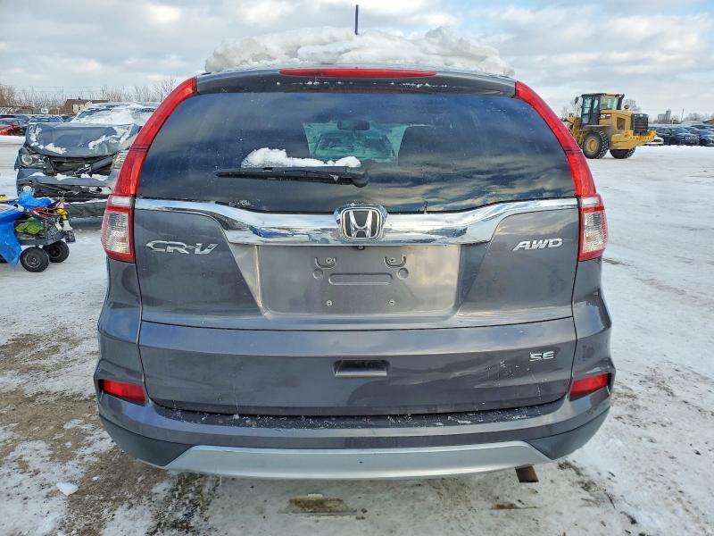 Photo 6 from auction – 2016 HONDA CR-V SE with VIN 2HKRM4H48GH135797