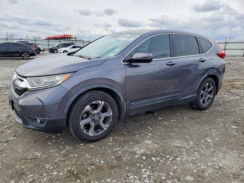 HONDA CR-V EX 2017 with VIN 7FARW1H55HE024243 - Photo from auction