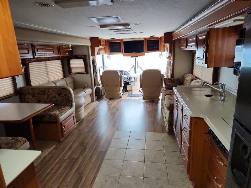 Photo 5 from auction – 2004 FREIGHTLINER TROPICAL T396 with VIN 4UZAAHDC94CN53119