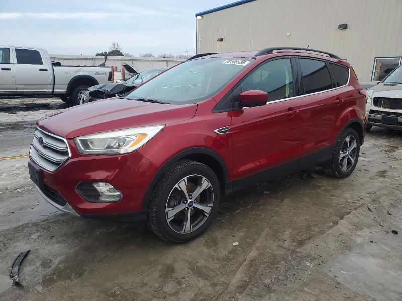 FORD ESCAPE SEL 2018 with VIN 1FMCU9HD9JUA18676 - Photo from auction