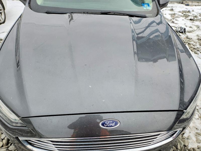 Photo 11 from auction – 2019 FORD FUSION with VIN 3FA6P0LU4KR125970