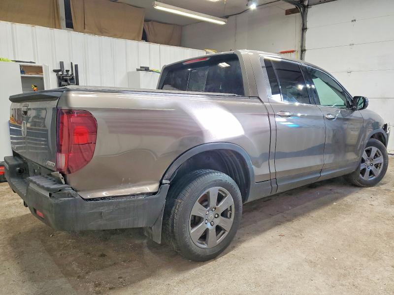 Photo 3 from auction – 2020 HONDA RIDGELINE with VIN 5FPYK3F76LB013853