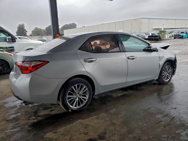 Photo 3 from auction – 2014 TOYOTA COROLLA L with VIN 5YFBURHE3EP153695