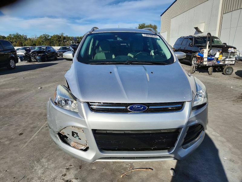 Photo 5 from auction – 2016 FORD ESCAPE TIT with VIN 1FMCU0J96GUB31186