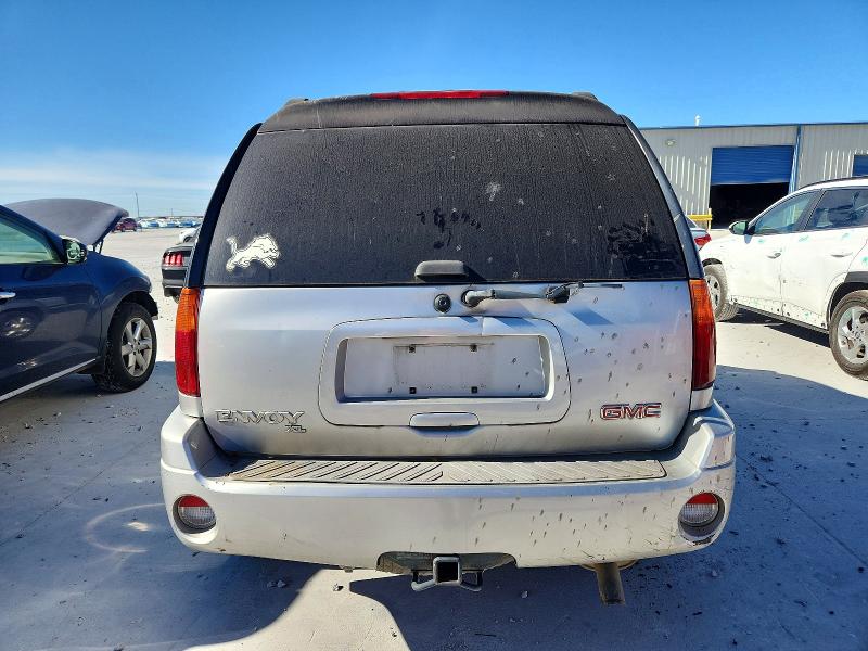 Photo 6 from auction – 2005 GMC ENVOY XL with VIN 1GKES16S156114435
