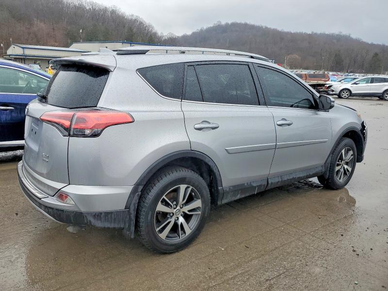 Photo 3 from auction – 2017 TOYOTA RAV4 XLE with VIN 2T3RFREV4HW581511