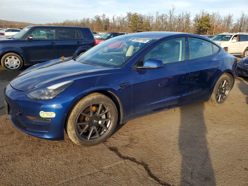 TESLA MODEL 3 2022 with VIN 5YJ3E1EB9NF101352 - Photo from auction