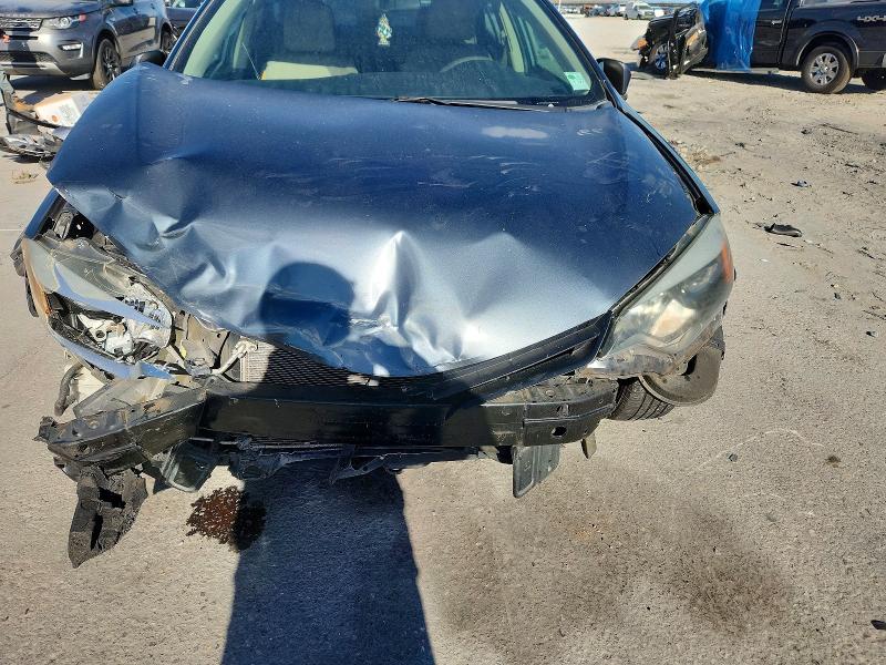 Photo 11 from auction – 2014 TOYOTA COROLLA with VIN 5YFBURHE9EP167777