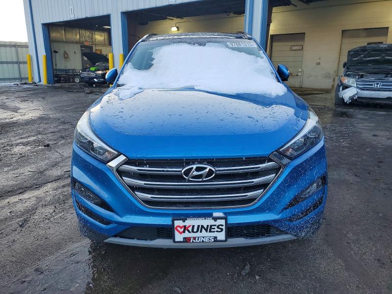 Photo 5 from auction – 2018 HYUNDAI TUCSON VALUE with VIN KM8J3CA22JU605897