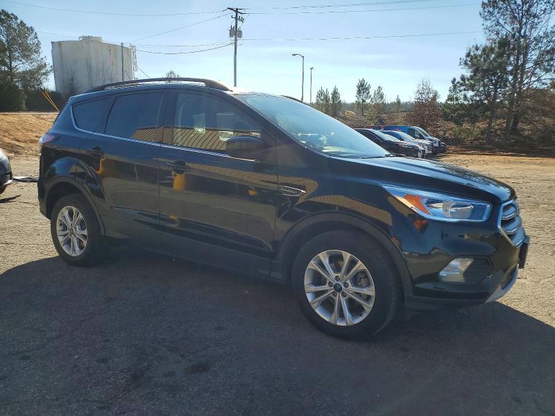 Photo 4 from auction – 2018 FORD ESCAPE SE with VIN 1FMCU0GD7JUC67703