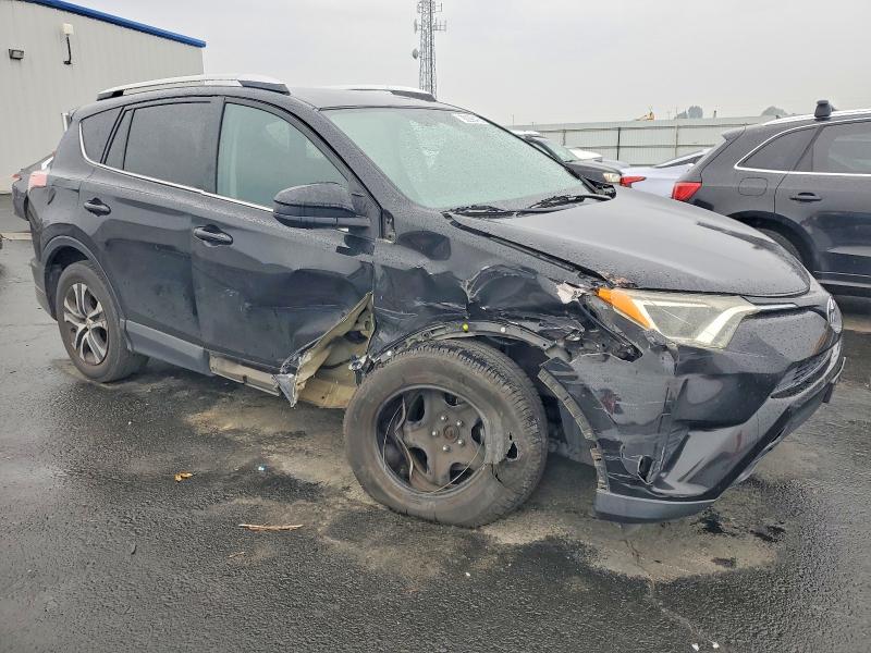 Photo 4 from auction – 2016 TOYOTA RAV4 with VIN 2T3ZFREV7GW300428