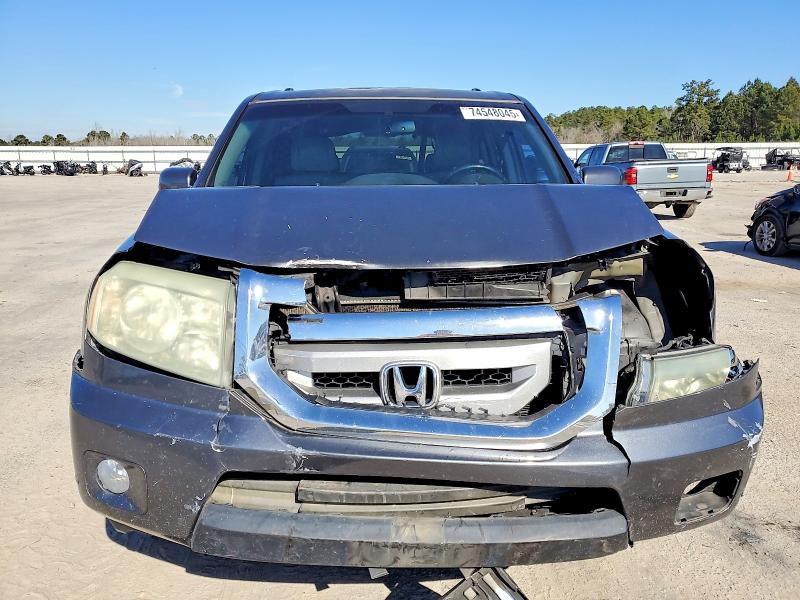 Photo 5 from auction – 2010 HONDA PILOT TOUR with VIN 5FNYF3H95AB008975