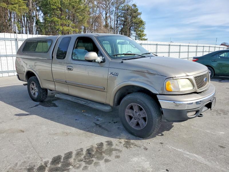 Photo 4 from auction – 2003 FORD F150 with VIN 1FTRX18L63NA16279