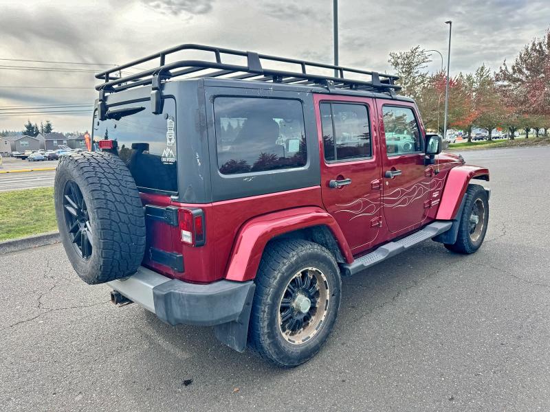 Photo 4 from auction – 2011 JEEP WRANGLER U with VIN 1J4BA5H17BL593450
