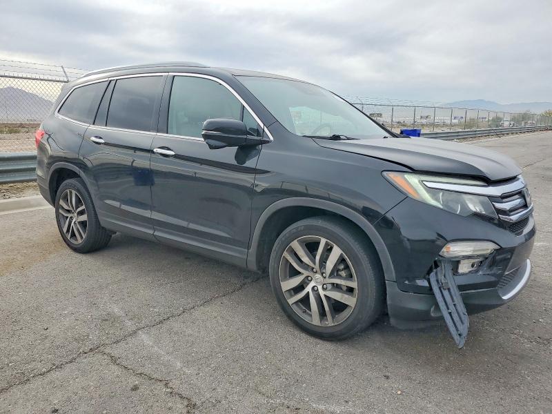 Photo 4 from auction – 2016 HONDA PILOT with VIN 5FNYF5H96GB044288