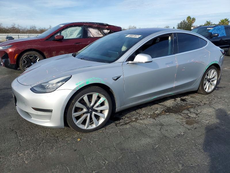 TESLA MODEL 3 2018 with VIN 5YJ3E1EB6JF069356 - Photo from auction