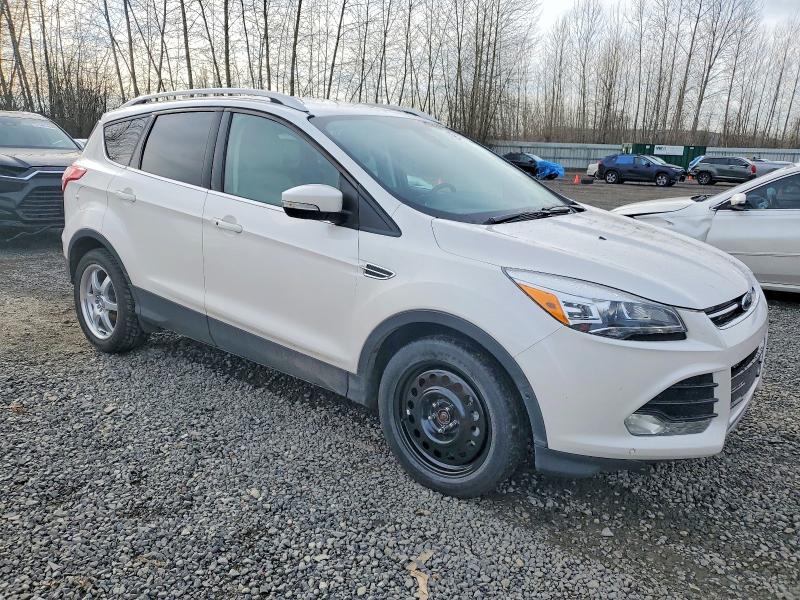 Photo 4 from auction – 2014 FORD ESCAPE TIT with VIN 1FMCU9J99EUD93334