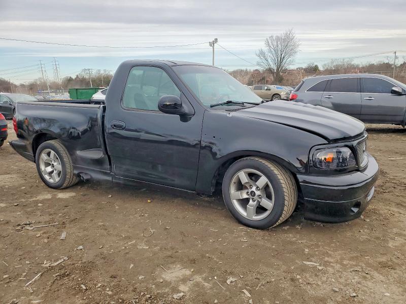 Photo 4 from auction – 2000 FORD F150 SVT L with VIN 2FTZF0734YCA91445